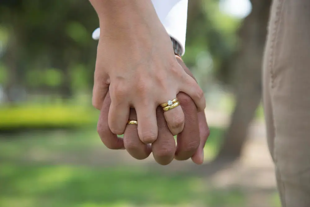 A couple holding hands